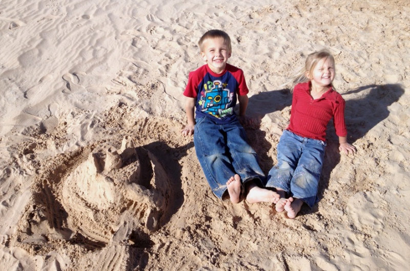 We built a sand castle down at Lonerock. Dad did not do a great job on it. But the kids don't know that ;)